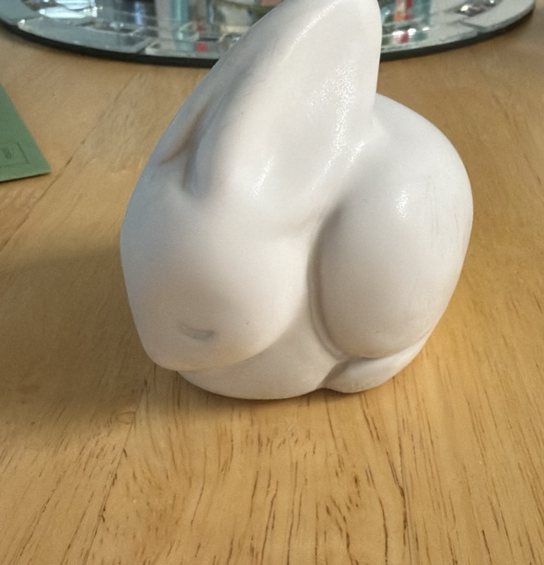 Late commercial Van Briggle crouching rabbit figurine in glossy white Moonglo glaze